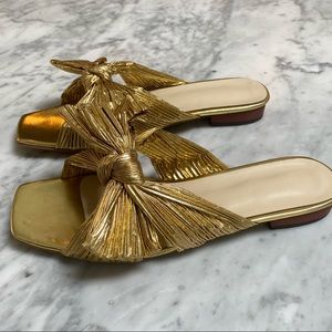 Gold bow flat sandals